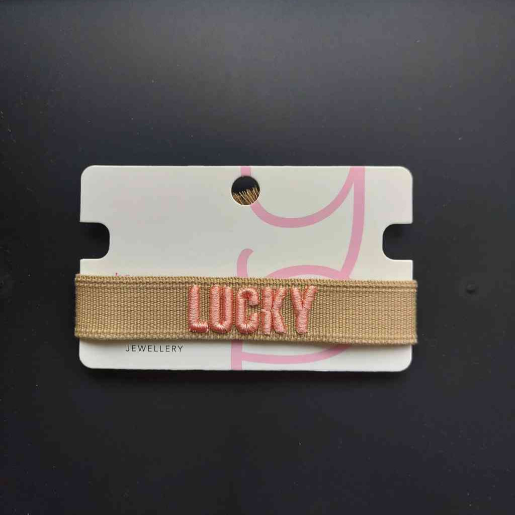 Armband LUCKY Statement-Band Webband in beige Bestickung in rosa Freundschaftsband erhältlich bei www.luiseundfritz.de