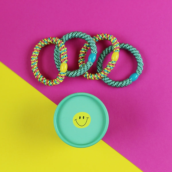 Haargummi 4er-Set mint/gelb in runder Geschenkbox mit Smile-Face
