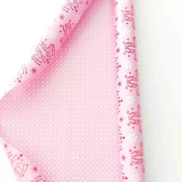 geschenkpapier beiseitig bedruckt winterliches motiv mit hirschen auf rosa, bei luiseundfritz.de
