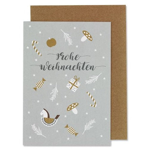 weihnachtskarte made in germany mit hübschen motiven wie schaukelpferd zuckerstange und mehr bei luiseundfritz.de